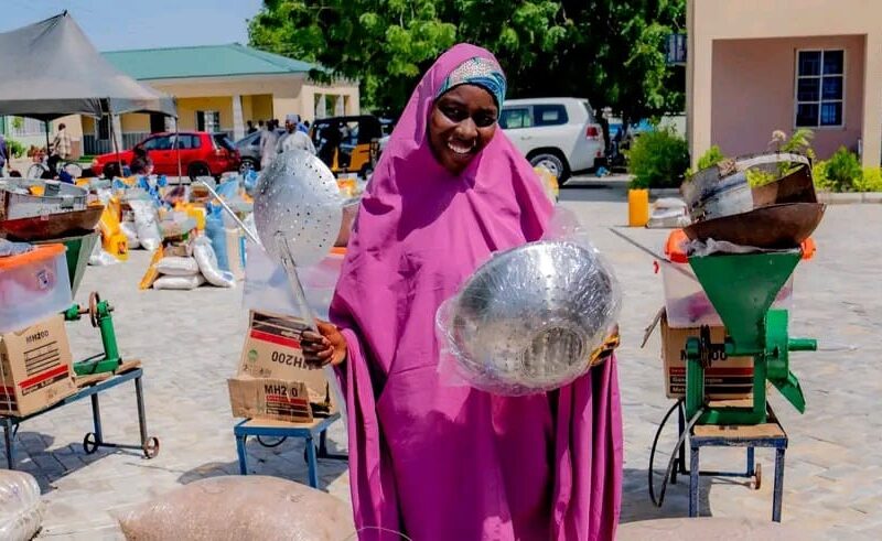 A displaced woman in Bama, beneficiary of a grinding machine by Humanitarian Aid Organizations.